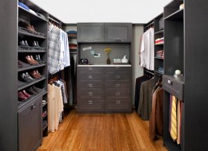 An organized dark grey closet for Men.