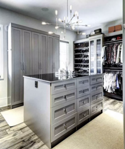 customized gray closet with the right lighting